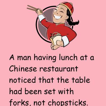 A Man Having Lunch At A Chinese Restaurant